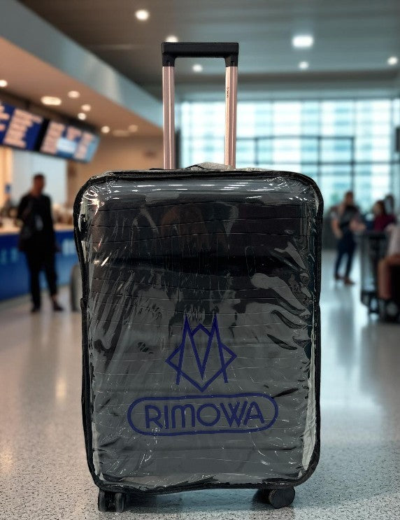 Rimowa Black Hard Shell Luggage Trolley – Lightweight Spinner Suitcase with 360° Wheels & Durable Build